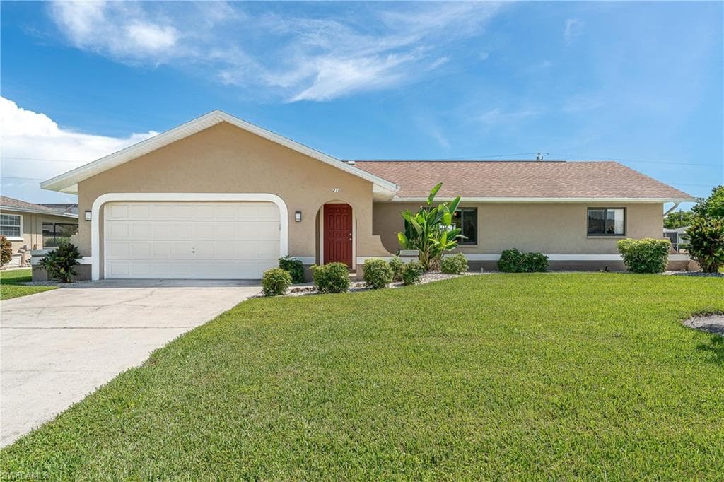 210 SW 38th TER CAPE CORAL, FL 33914