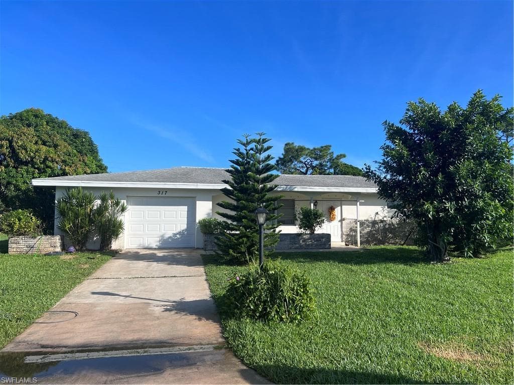 317 Hollywood ST N LEHIGH ACRES, FL 33936