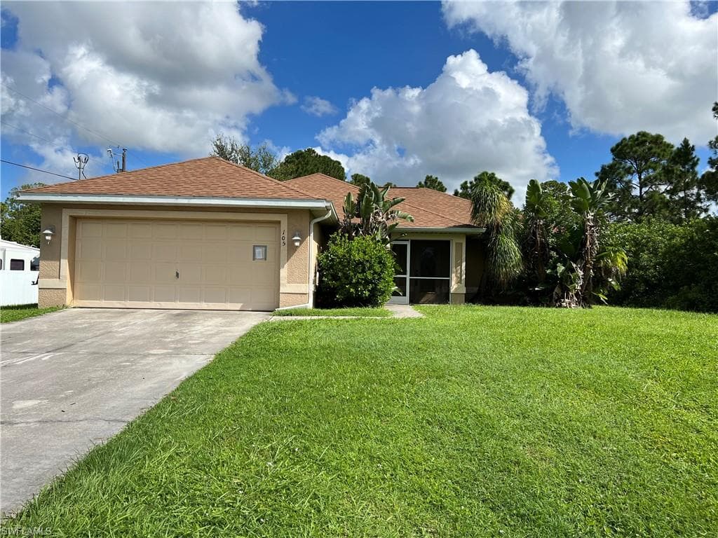 105 E 11th ST LEHIGH ACRES, FL 33972