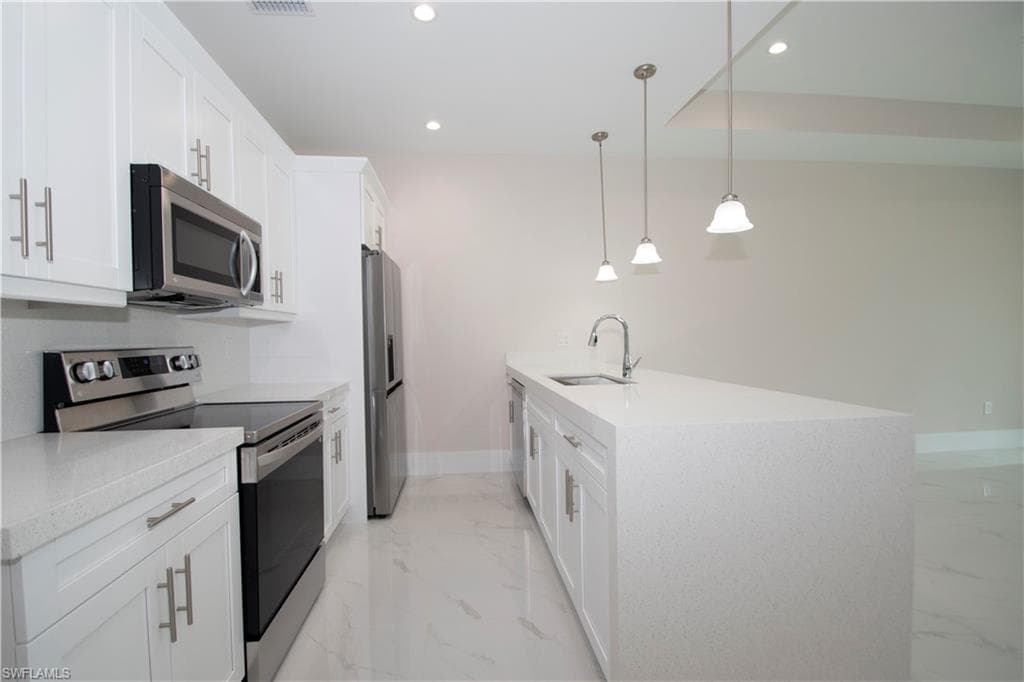 122/124 SE 12th TER CAPE CORAL, FL 33990