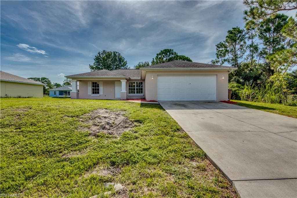 1049 Bassinger AVE S LEHIGH ACRES, FL 33974
