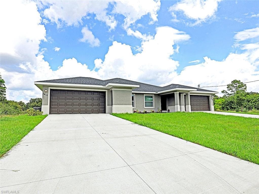 2408 Xelda AVE N 2410 LEHIGH ACRES, FL 33971