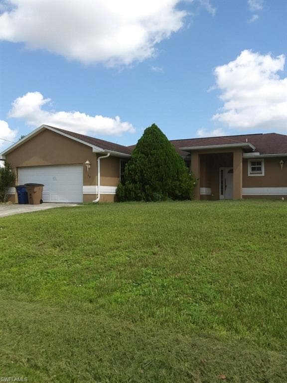 3208 38th ST SW LEHIGH ACRES, FL 33976