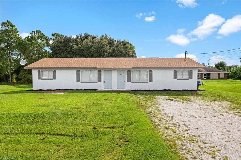 113/115 Gordon AVE S LEHIGH ACRES, FL 33973