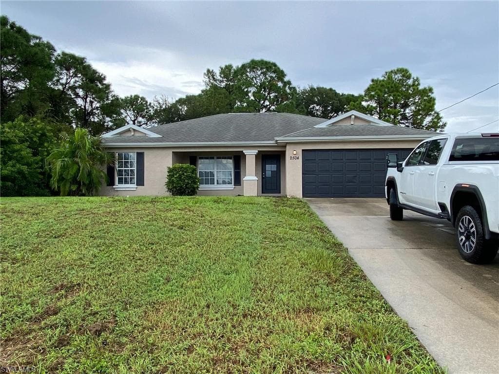 2504 38th ST SW LEHIGH ACRES, FL 33976