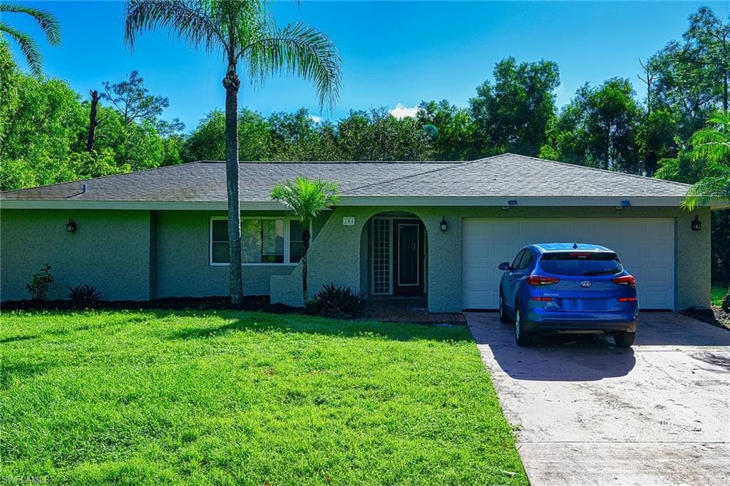 204 Monroe AVE LEHIGH ACRES, FL 33936
