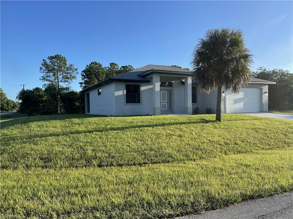 606 Lincoln BLVD LEHIGH ACRES, FL 33936