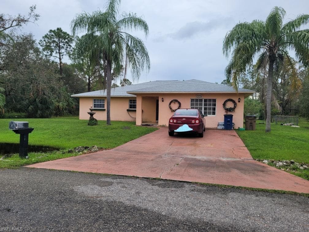 1414 McArthur AVE LEHIGH ACRES, FL 33972