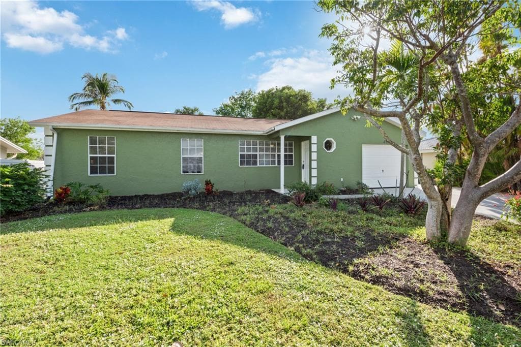 411 Quail DR MARCO ISLAND, FL 34145