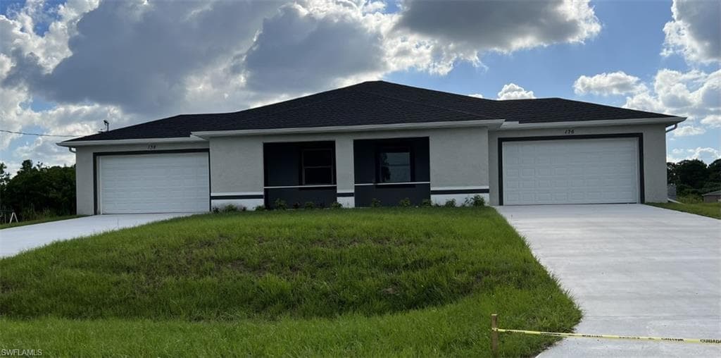 113-115 Gilbert AVE S LEHIGH ACRES, FL 33973