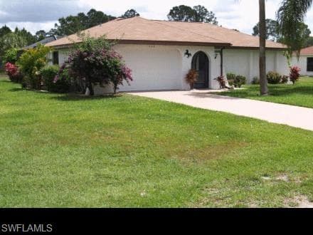 406 Roosevelt AVE LEHIGH ACRES, FL 33936