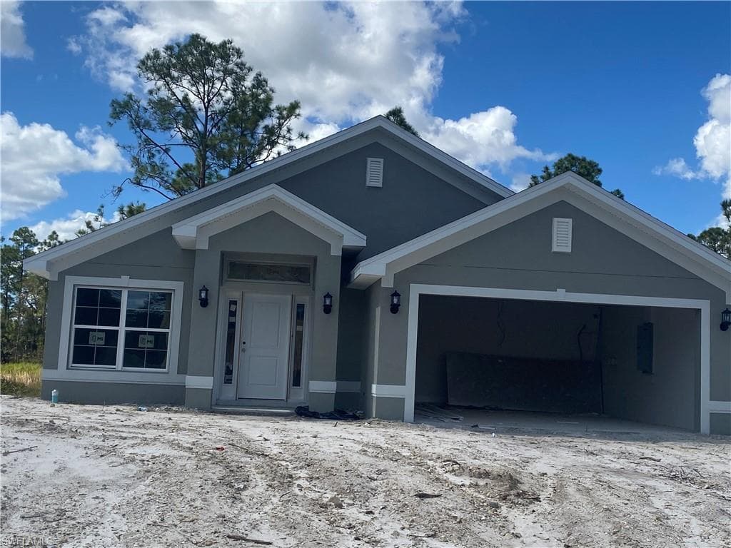 1911 LEMONA AVE LEHIGH ACRES, FL 33972