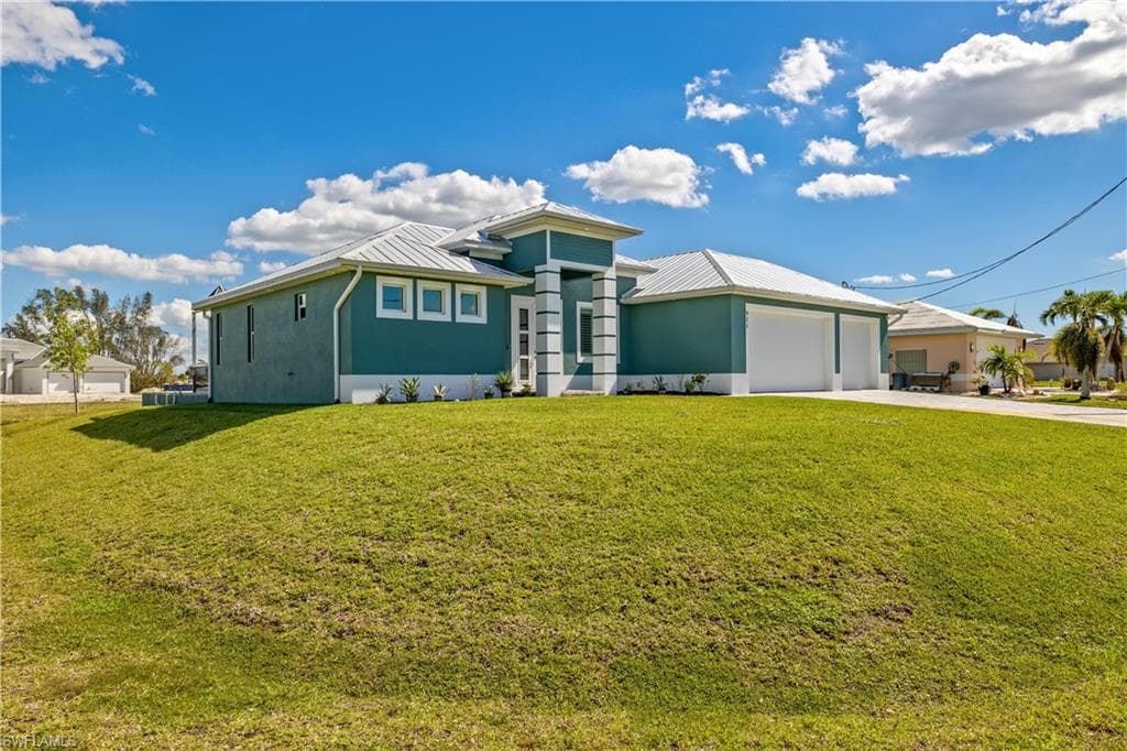 911 NW 38th PL CAPE CORAL, FL 33993