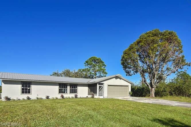 302 Floyd AVE S LEHIGH ACRES, FL 33976