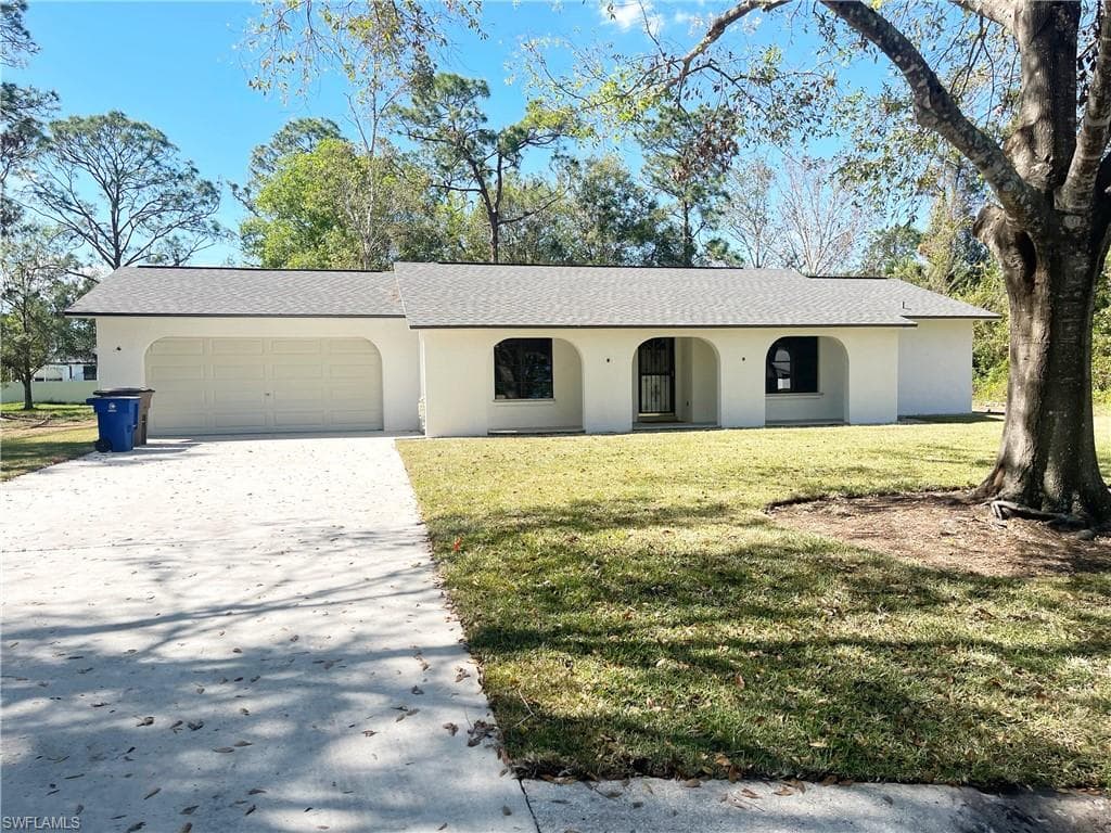 507 Maple AVE N LEHIGH ACRES, FL 33972
