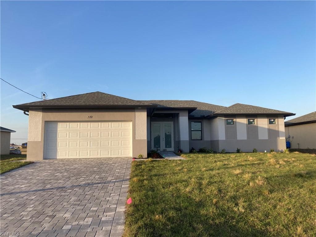 309 NE 15th TER CAPE CORAL, FL 33909