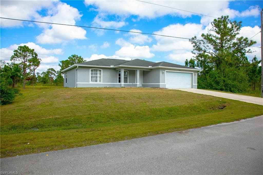 879 Asher ST E LEHIGH ACRES, FL 33974