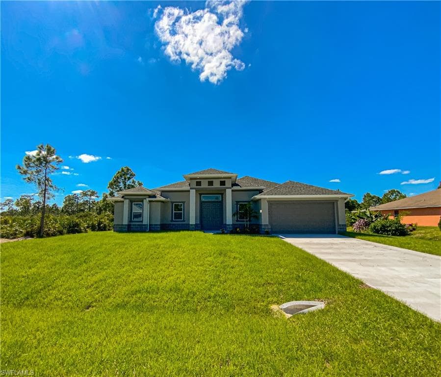317 Ranier AVE LEHIGH ACRES, FL 33974