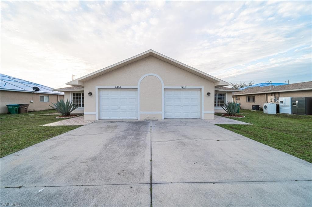 1402-1404 Country Club BLVD CAPE CORAL, FL 33990