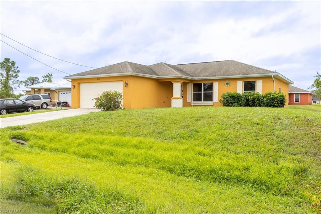 818 Crystal AVE S LEHIGH ACRES, FL 33974
