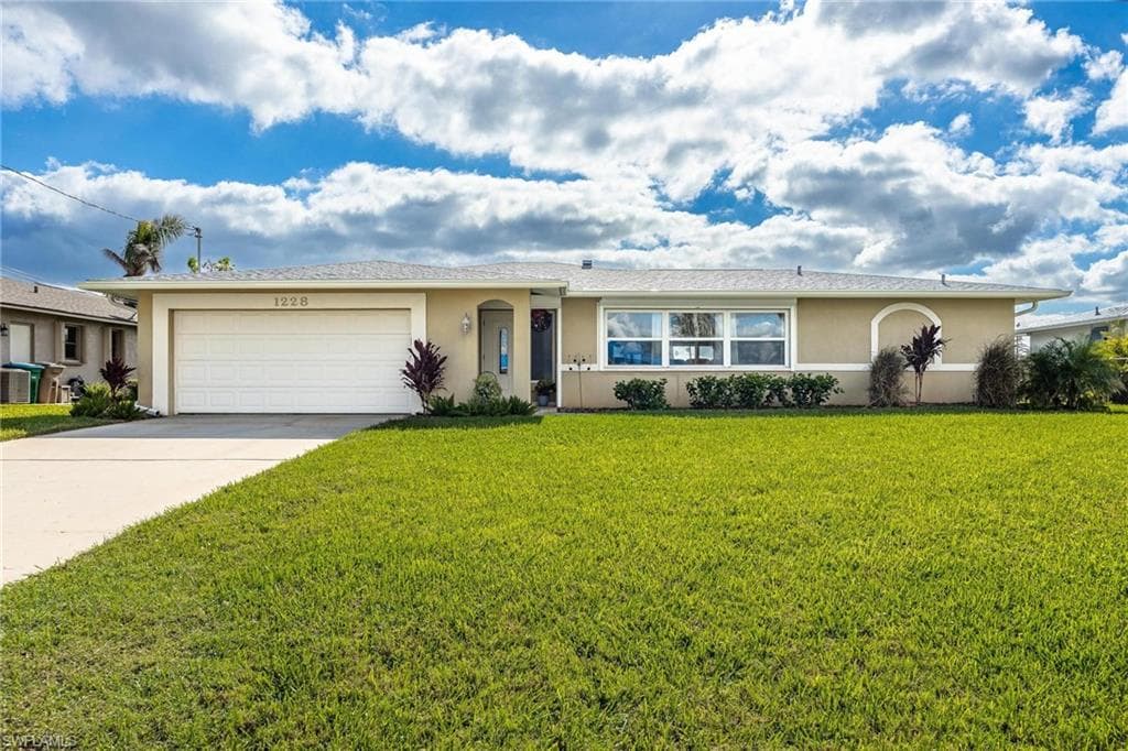 1228 Shelby PKWY CAPE CORAL, FL 33904