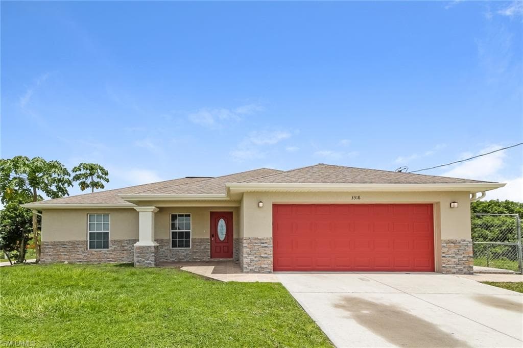 3318 34th ST SW LEHIGH ACRES, FL 33976