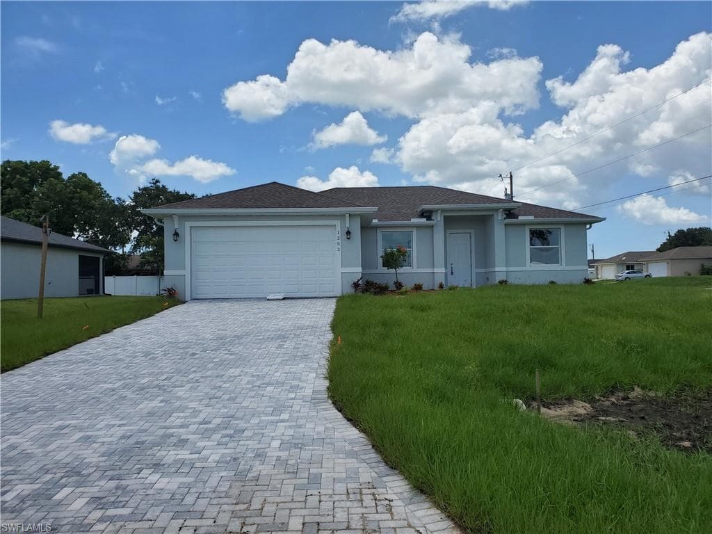 1202 NW 4th AVE CAPE CORAL, FL 33993