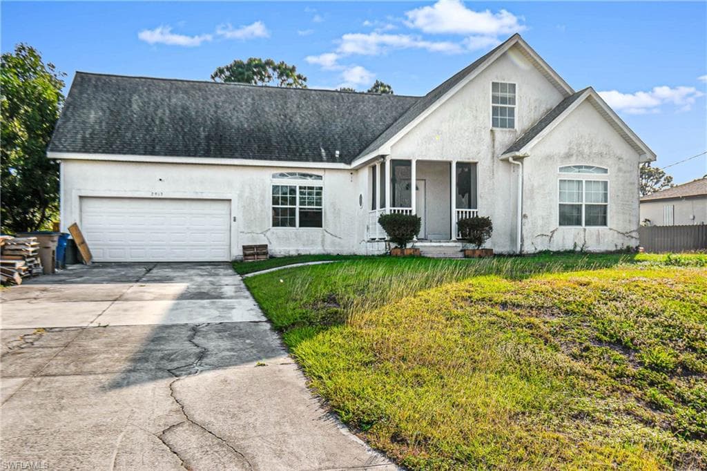 2913 13th ST SW LEHIGH ACRES, FL 33976