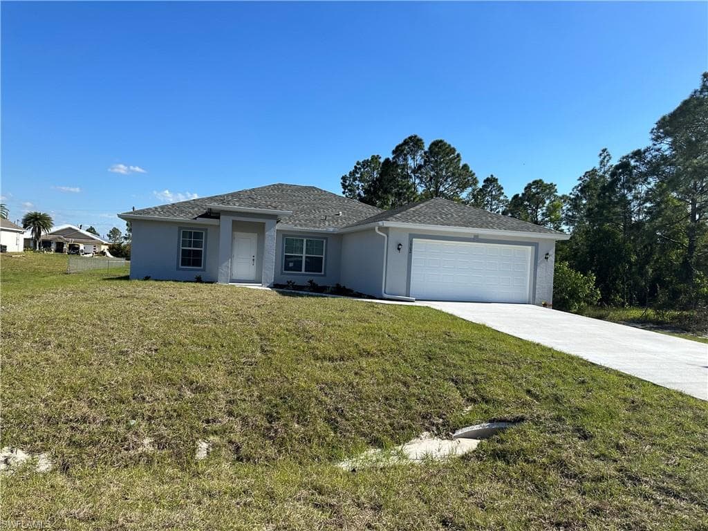 1902 Carlson AVE N LEHIGH ACRES, FL 33971