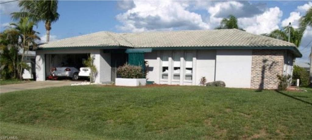 1927 SE 10th AVE CAPE CORAL, FL 33990
