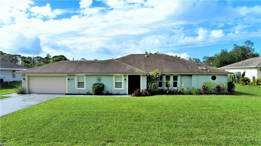 415 Greenwood AVE LEHIGH ACRES, FL 33972