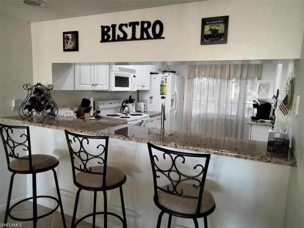 4120 LOOKING GLASS LN 3706 NAPLES, FL 34112