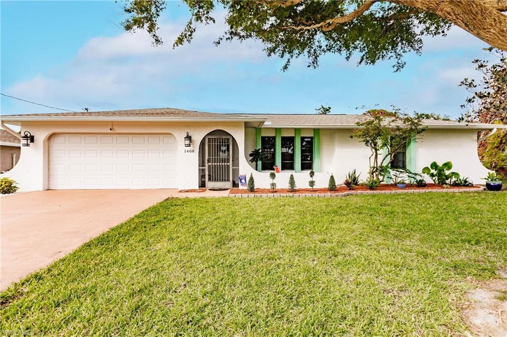 1408 23rd AVE CAPE CORAL, FL 33990