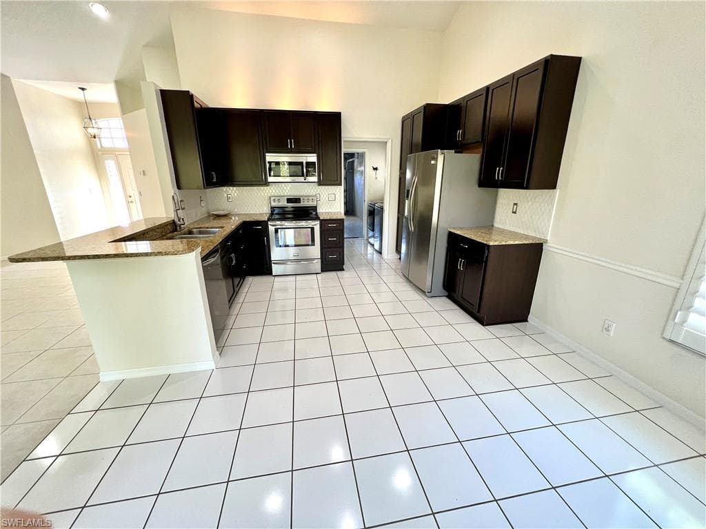 687 Melville CT NAPLES, FL 34104