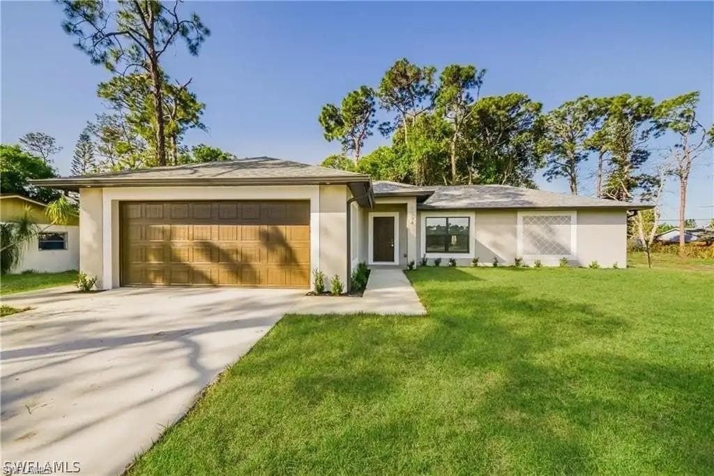 719 Nimitz BLVD LEHIGH ACRES, FL 33974