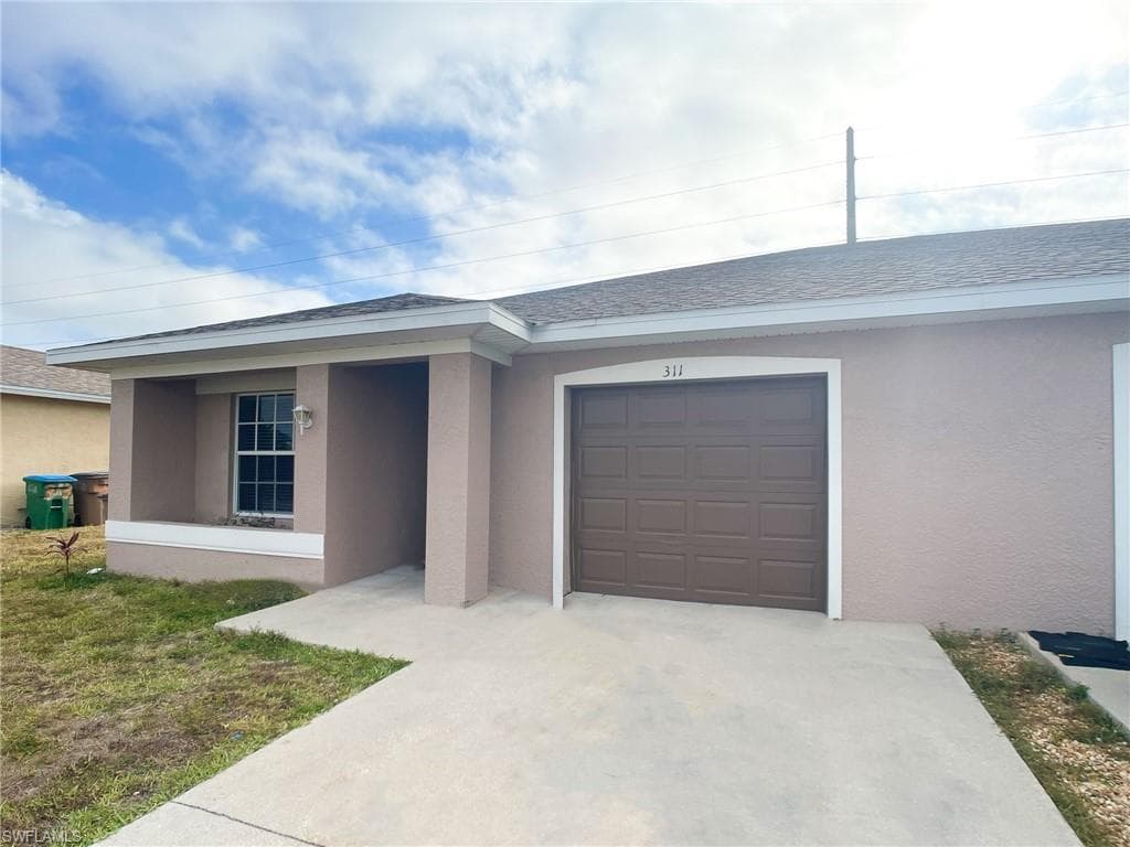 311 NE 24th AVE CAPE CORAL, FL 33909