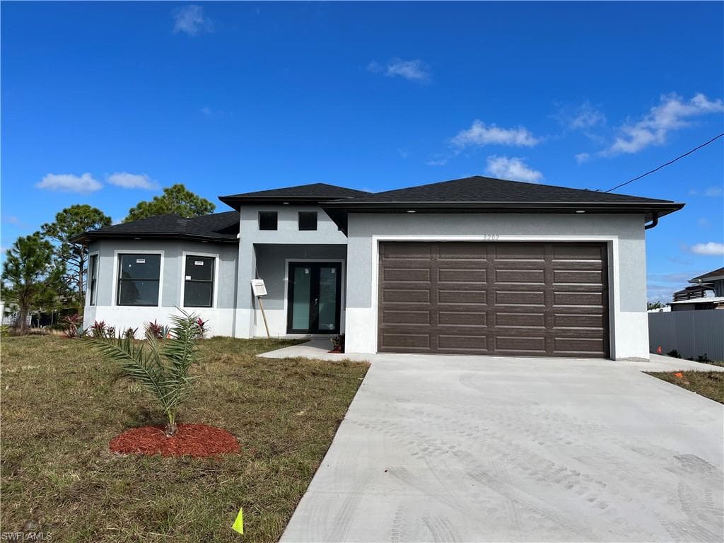 3202 11th ST SW LEHIGH ACRES, FL 33976