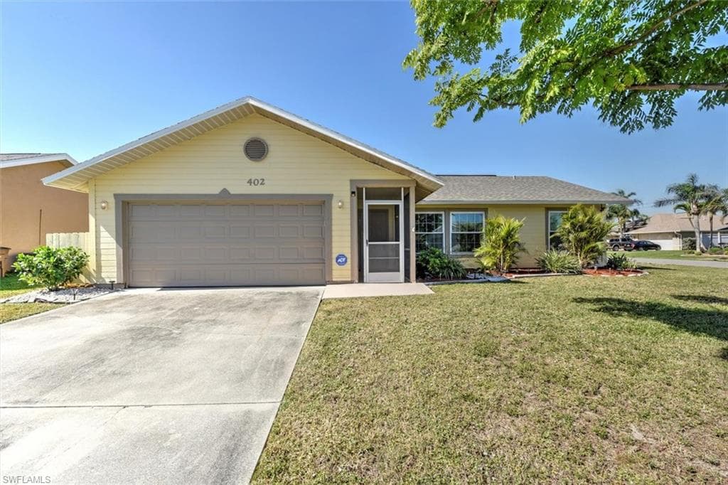 402 SE 10th AVE CAPE CORAL, FL 33990