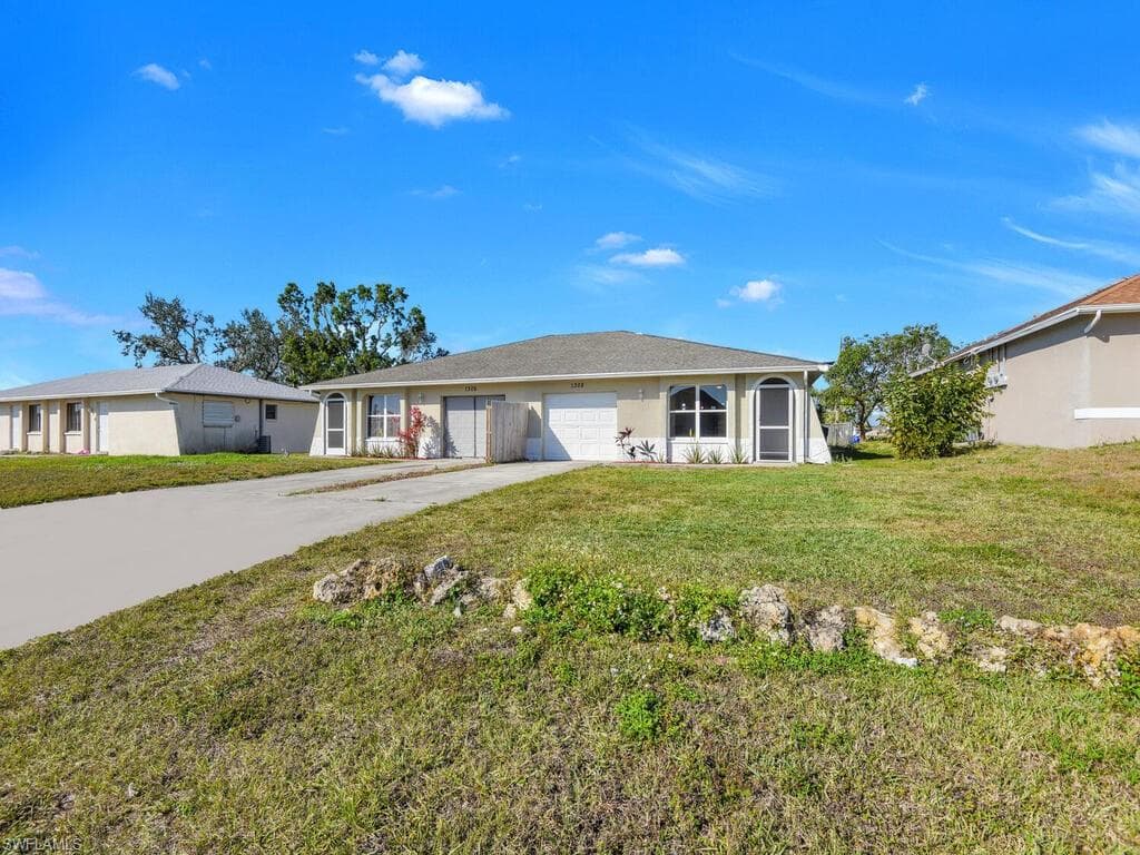1306/1308 NE 8th PL CAPE CORAL, FL 33909