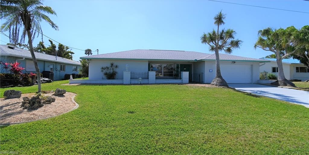 616 Wildwood PKWY CAPE CORAL, FL 33904