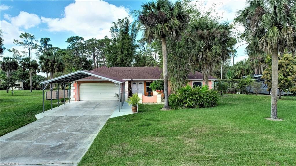 207 Maple AVE N LEHIGH ACRES, FL 33936