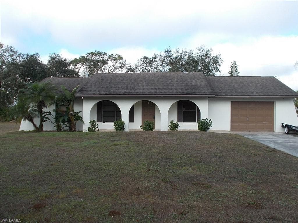 203 Gerald AVE N LEHIGH ACRES, FL 33971