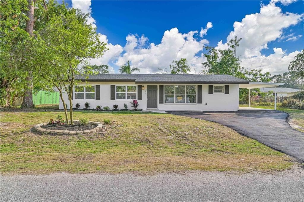 1104 E Bougainvillea RD LEHIGH ACRES, FL 33936