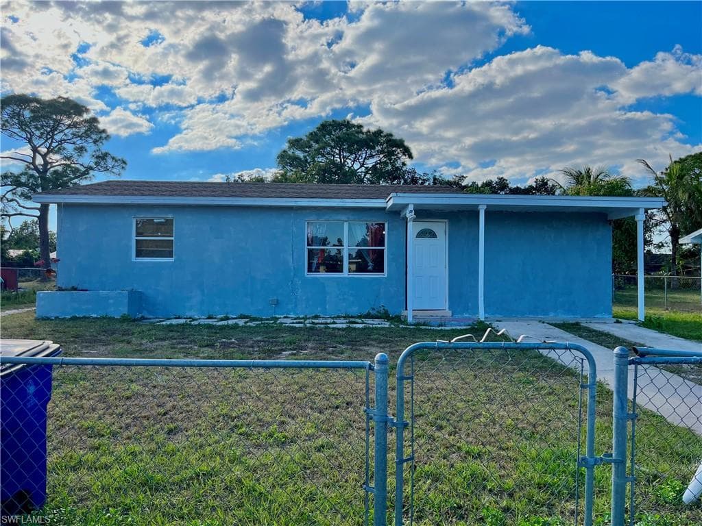 414 MORGAN CIR S LEHIGH ACRES, FL 33936