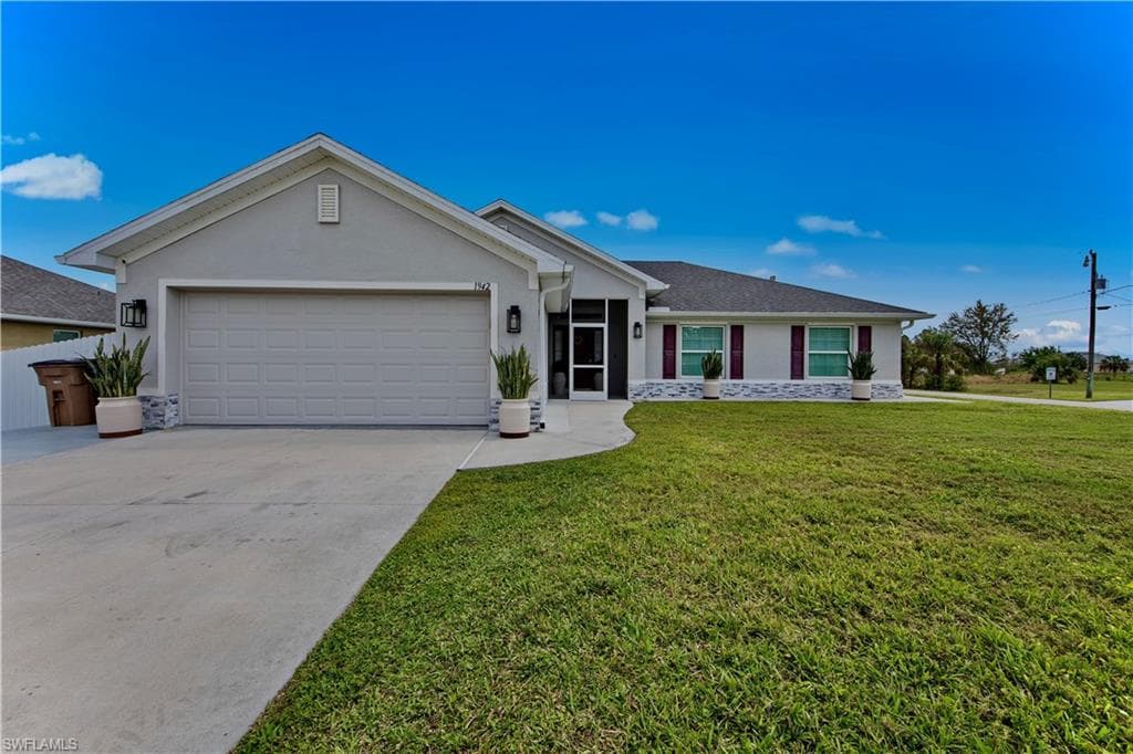 1942 Redmont AVE LEHIGH ACRES, FL 33972