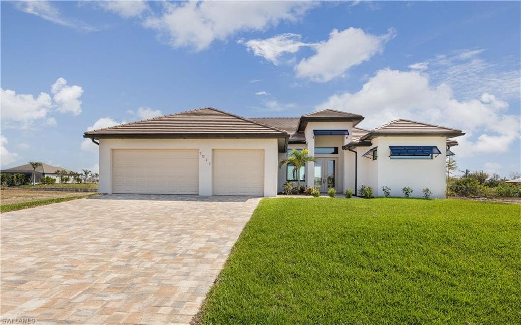 1027 NW 38th AVE CAPE CORAL, FL 33993