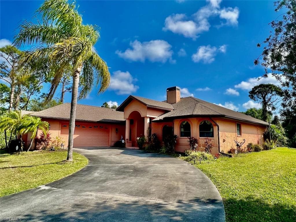 610 Maple AVE N LEHIGH ACRES, FL 33972