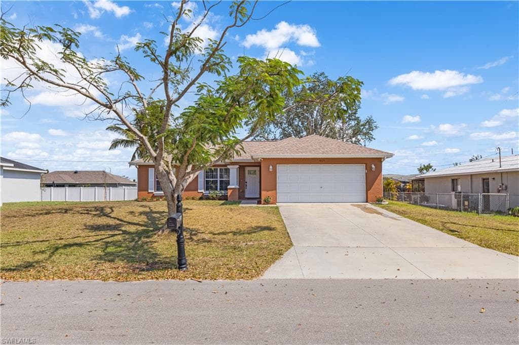 617 NE Juanita CT CAPE CORAL, FL 33909