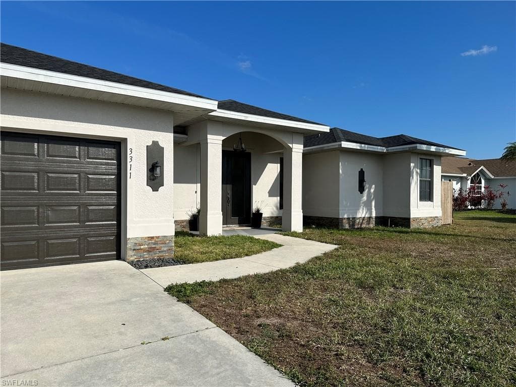 3311 SW 1st AVE CAPE CORAL, FL 33914