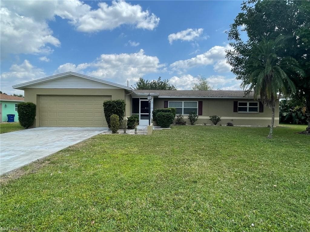 112 E Lake DR LEHIGH ACRES, FL 33936